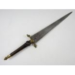 A late 17th Century style plug bayonet, having turned hard-wood grip with brass winged-figure