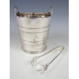 An Elkington electroplate ice bucket, of coopered form, together with a pair of tongs, 13 cm high