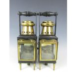 A pair of Victorian brass and iron railway or carriage lanterns, 36 cm