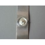 A 1960s lady's 18ct white gold dress watch, having 17-jewel Swiss movement with circular radially-