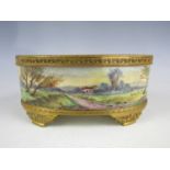 A late 19th Century gilt metal mounted bowl, of oval section, continuously decorated to the