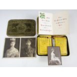 A Princess Mary 1914 gift tin with original contents and card, (tin a/f)