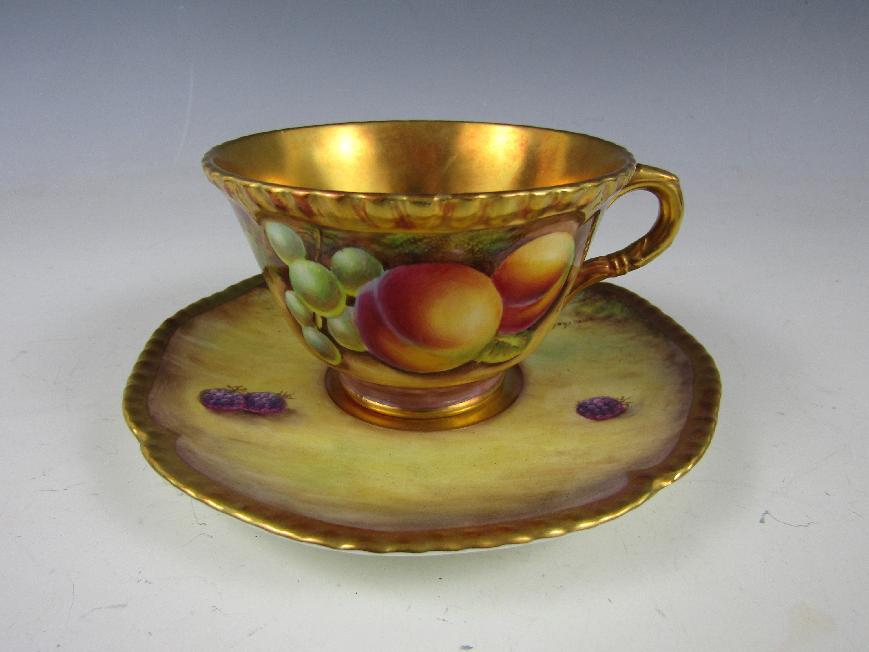 A Coalport bone china trio, each item painted with a fruit still life, comprising tea cup, saucer - Image 6 of 6