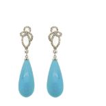 White gold, diamonds and turquoise earrings Pendientes en oro blanco con motivo entrelazado de