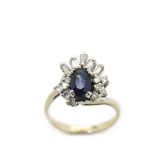 White gold, sapphire and diamonds ring Sortija en oro blanco con zafiro azul talla oval y