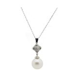 White gold, diamonds and Australian pearl pendant Colgante en oro blanco con motivo de pavé de