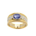 Gold, white gold, blue sapphire and diamonds ring