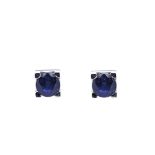 White gold and blue sapphire earrings Pendientes solitario en oro blanco con zafiro azul talla