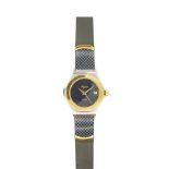 Mercury steel, gold plated and rubber wristwatch