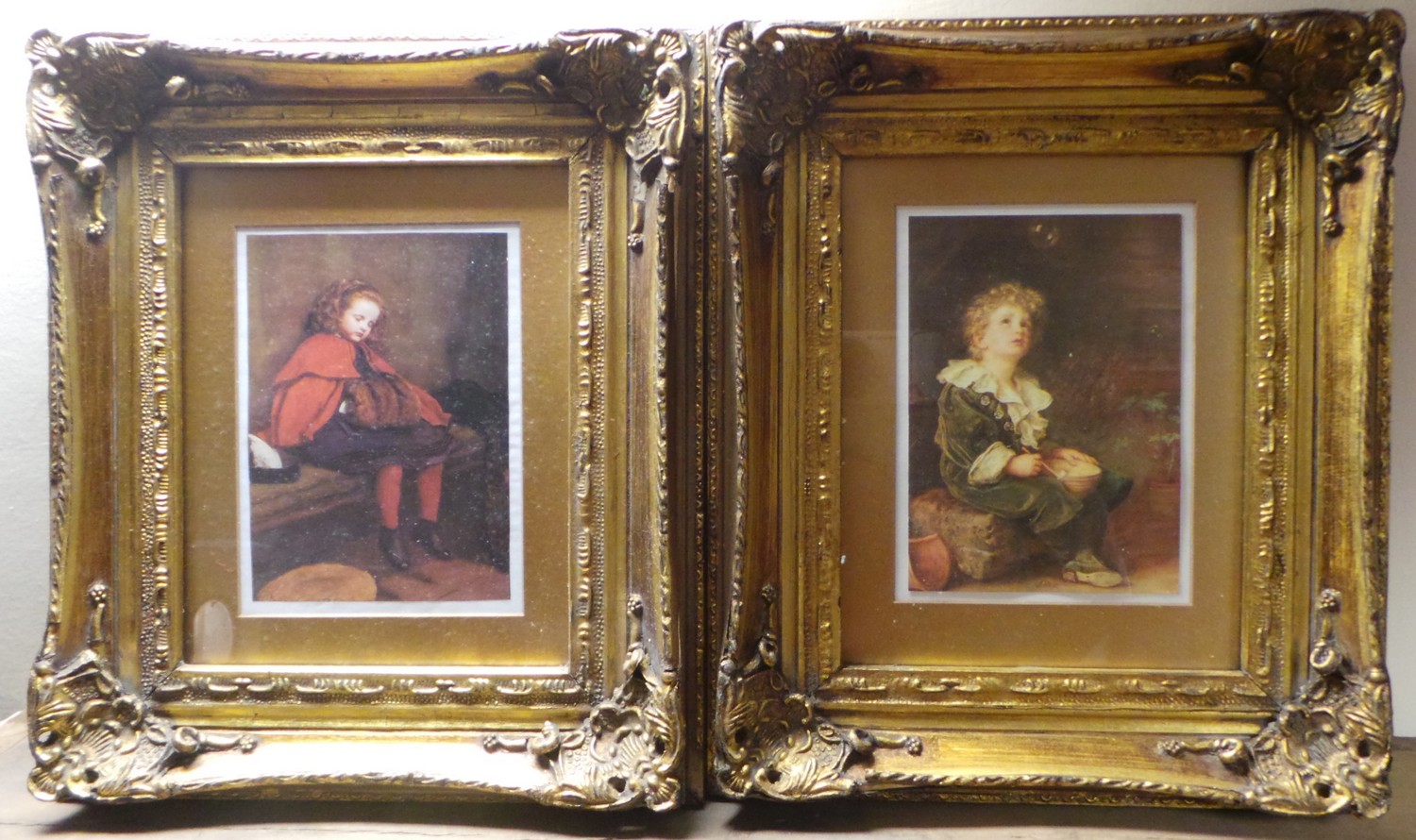 Pair of Gilt-framed Prints