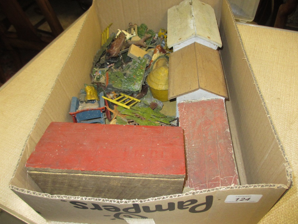 Box containing a quantity of various Britains die-cast farm toys with lead animals and various