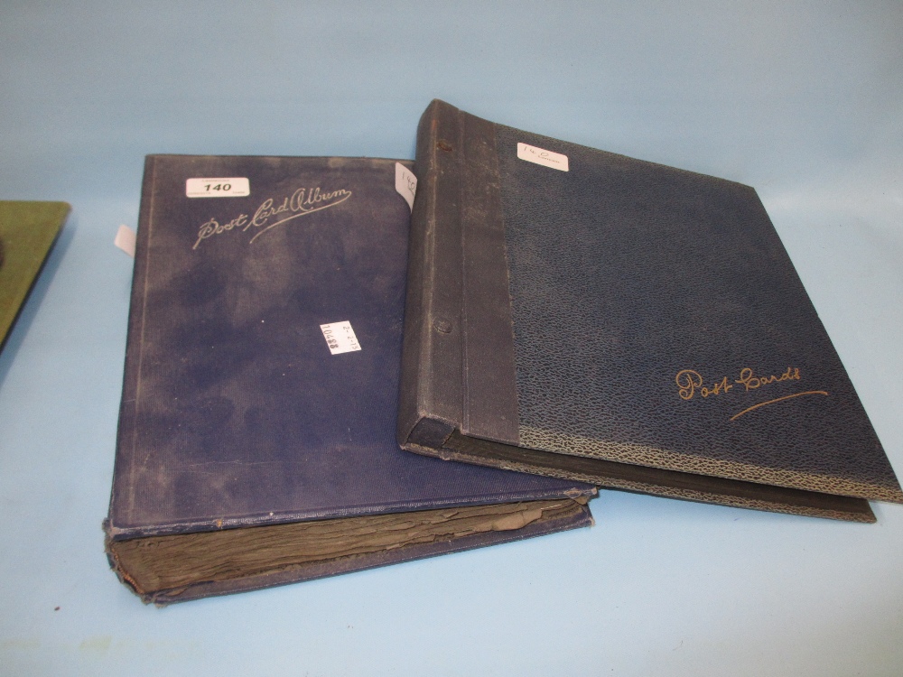 Two early 20th Century blue albums containing World War I scenes,