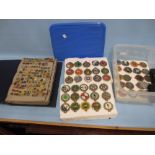 Album containing a large quantity of various small enamel pin badges and a box containing a