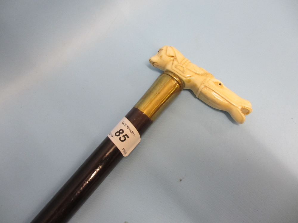 Two part walking stick with Chinese carved ivory handle