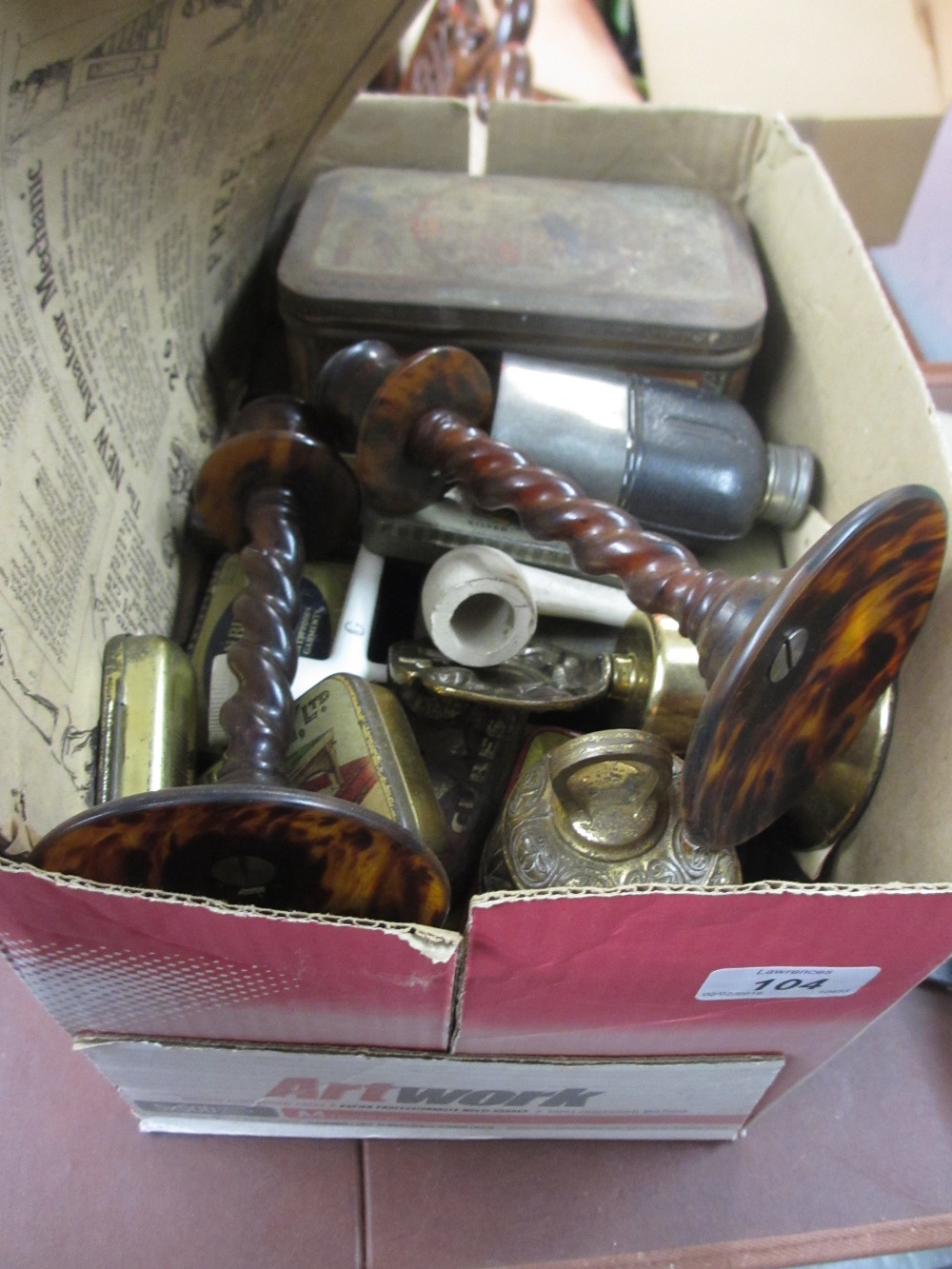 Box containing a quantity of various trade tins including a pair of Bakelite candlesticks etc.