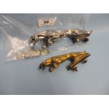 Two Jaguar car mascots in chrome and gilt metal