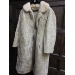 Ladies lambs wool three quarter length coat with a fur collar