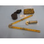 Small ivory and metal mounted folding rule, a magnifying glass, a small box in the form of coins,