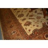 Large Afghan Ziegler carpet having all-over floral design with multiple borders on a beige ground,
