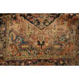 Small Heriz rug with medallion design (worn)