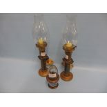Pair of late 19th or early 20th Century brass ships candlesticks with glass shades and fitted