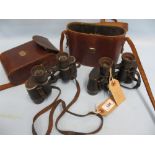 Two cased pairs of binoculars