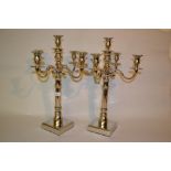Pair of nickel plated five branch candelabra on square bases