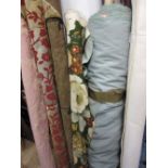 Six rolls of various upholstery fabric