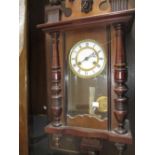 Small 19th Century walnut cased Vienna style wall clock with a two train spring driven movement