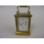 Miniature gilt brass cased carriage clock, the enamel dial with Roman numerals,