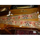 19th Century needlepoint border strip with floral design on red ground