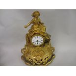 19th Century gilded spelter mantel clock having circular enamel dial with Roman numerals and single