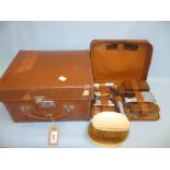 Gentleman's leather dressing case with original fittings,