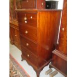 Narrow mahogany line inlaid and crossbanded chest of four short drawers with brass ring handles