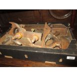 Box containing a quantity of various woodworking planes etc.