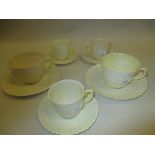 Group of five various Belleek porcelain tea cups and saucers (brown mark)