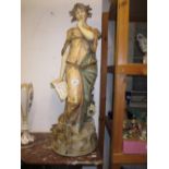 Large late 19th Century Continental porcelain figure of a standing girl (damages and repairs)
