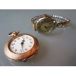 Yellow gold floral decorated fob watch with ceramic dial having Arabic numerals together with a