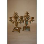 Pair of 20th Century brass two branch candelabra on square pierced bases with scroll feet (a/f)