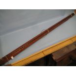 Hardy's patent steel centre three section fishing rod with a wooden carrying case