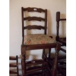 Set of six (four plus two) oak ladder back dining chairs on turned supports