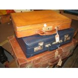 Leather suitcase together with two briefcases