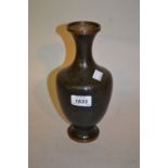 20th Century cloisonne baluster form vase on a black ground,