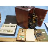 Early 20th Century mahogany cased black Japanned and gilt brass monocular microscope by Belcher and