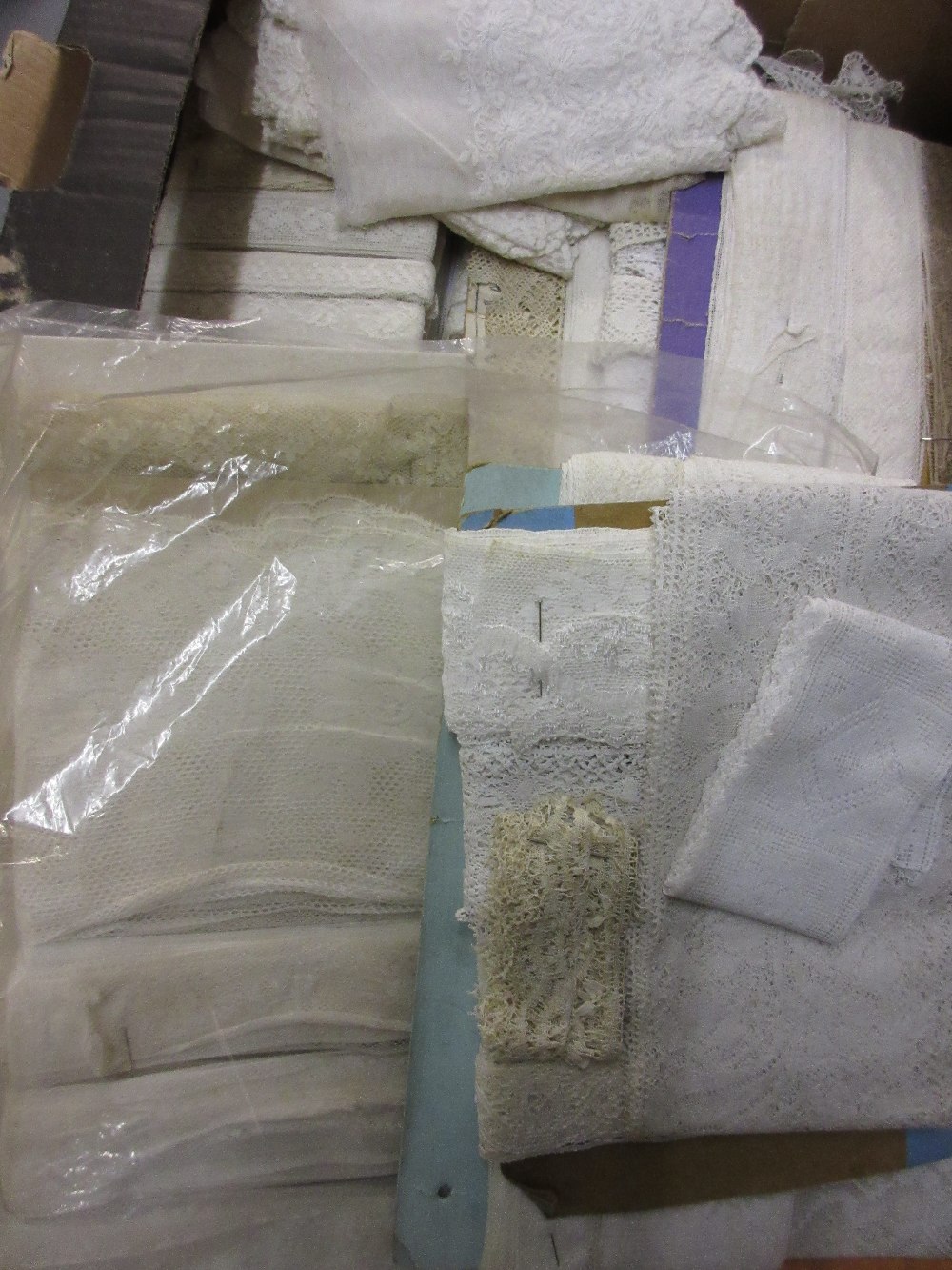 Box containing a quantity of various hand made and other lace