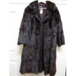 Ladies three quarter length dark brown fur coat