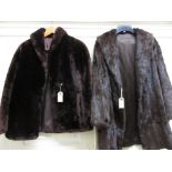 Ladies dark brown fur jacket together with a three quarter length similar fur coat