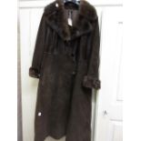 Suede and mink trimmed ladies coat