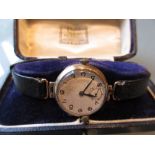 Ladies 9ct gold wristwatch on a leather strap