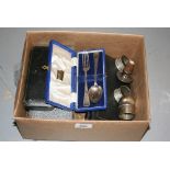 Various cased sets of silver including: a Christening set, coffee spoons, ladle,